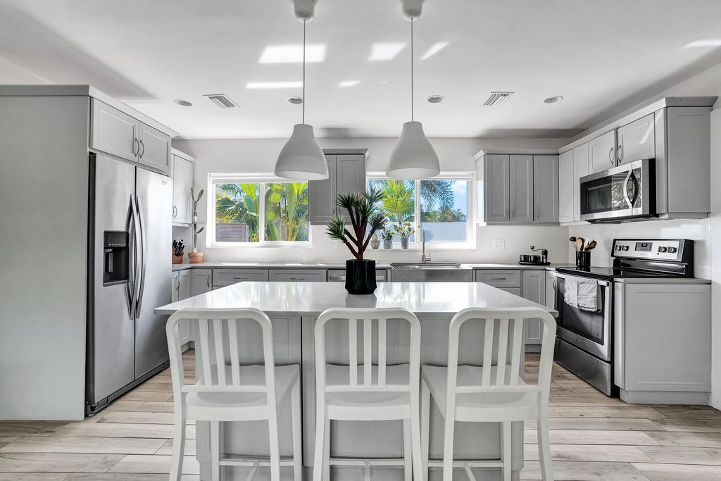 Photo of 1299 SW 9th Street, Boca Raton, FL 33486 (MLS # B26012127)