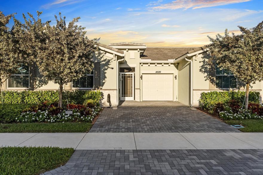 Reduced to sell quickly! Freshly painted!!Absolutely gorgeous, 2/2 villa with bonus room that can be easily made into a 3rd bedroom, and a 1 car garage. Tile throughout, with upgrades galore! Custom lighting, closets, fans, tile backsplashes in the kitchen, seamless glass showers, faucets and a screened in patio. The large owners suite has a large walk in closet, and the bathroom has a large double vanity, lg shower and a separate toilet closet. Avalon Trails offers something for everybody from the gorgeous clubhouse with 2 pools, card rooms, arts & crafts room, gym, yoga room, cafe, and 150 seat theatre where you can see great shows. over 2 miles of walking paths for that sunset walk. We love dogs at Avalon Trails!! This home shows better than the builders model as it was hardly lived in!