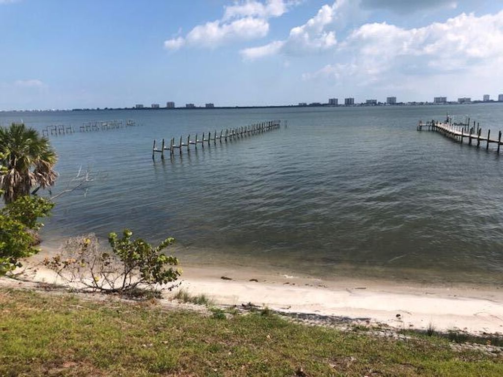 Photo of 12835 S Indian River Drive, Jensen Beach, FL 34957 (MLS # R10872865)