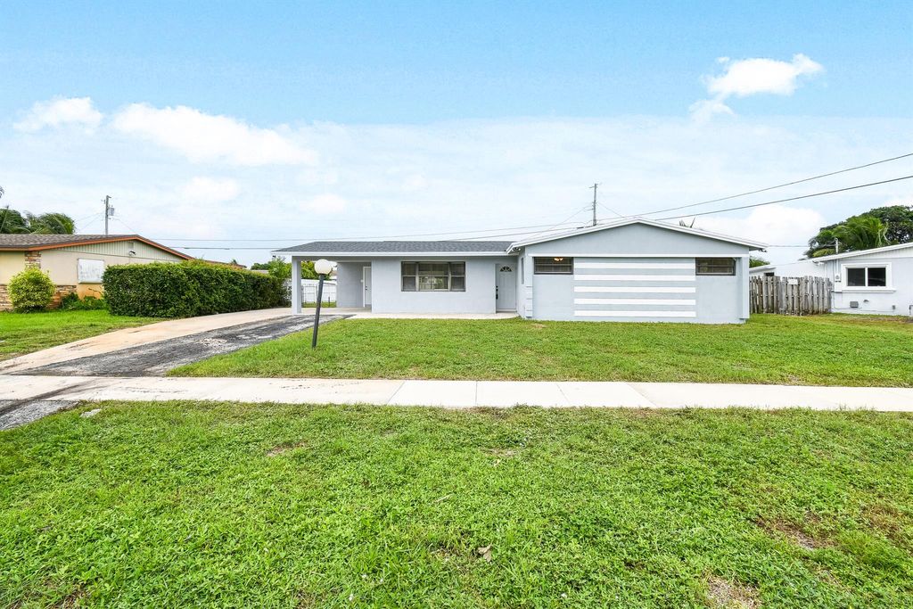 Photo of 3309 Housatonic Drive, West Palm Beach, FL 33406 (MLS # R11028072)