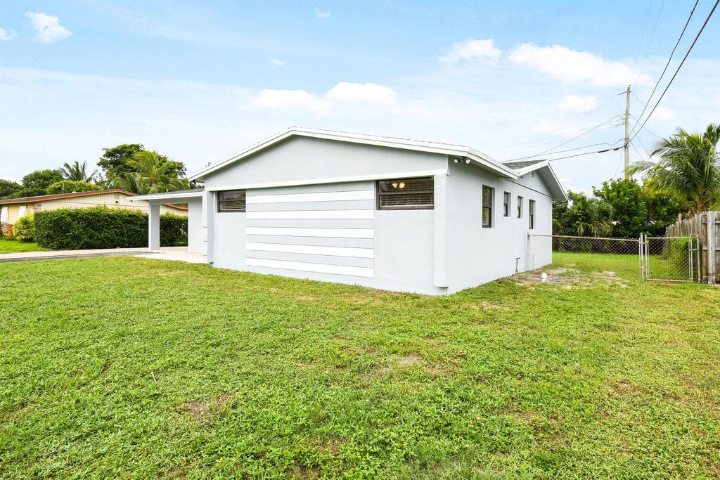 Photo of 3309 Housatonic Drive, West Palm Beach, FL 33406 (MLS # R11028072)