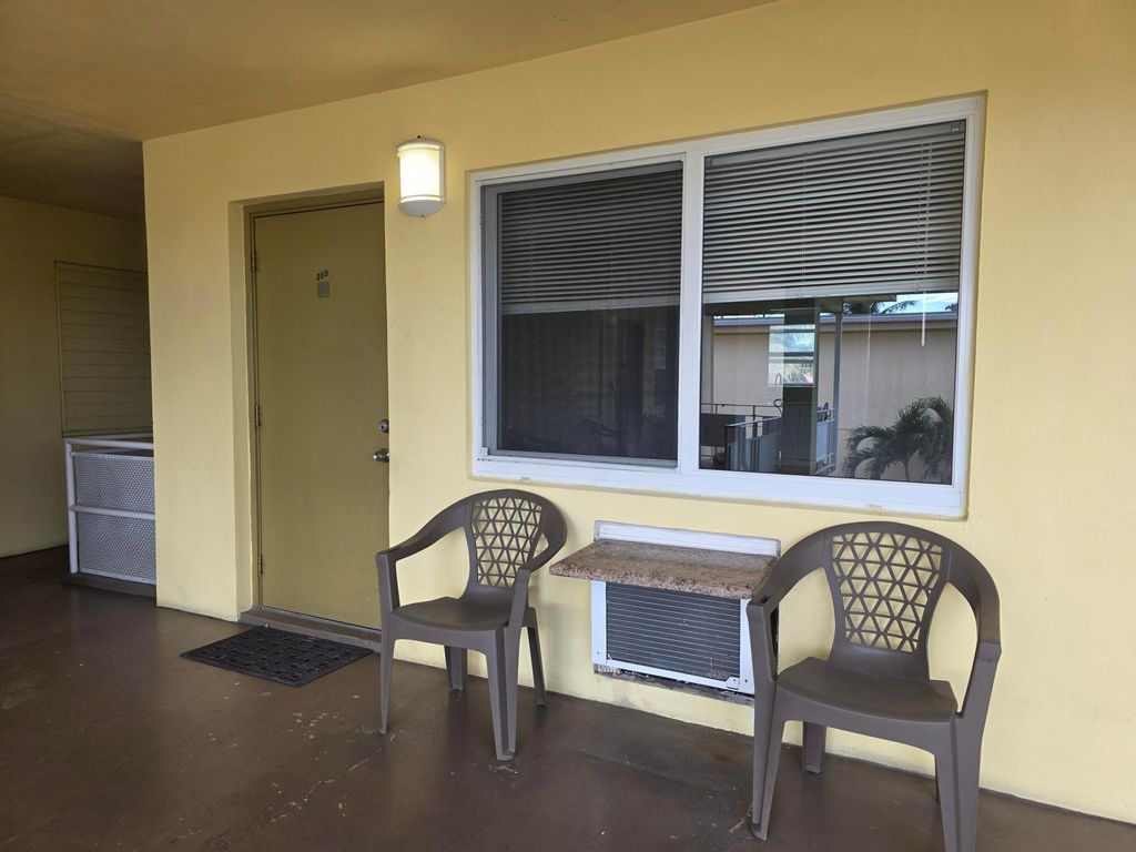 Photo of 911 N Federal Highway #205, Lake Worth Beach, FL 33460 (MLS # B26022183)