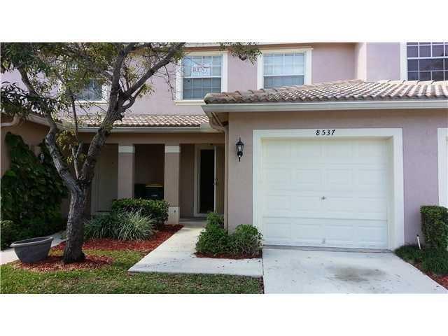 Photo of 8537 W SOUTHGATE SHORES Circle E, Tamarac, FL 33321 (MLS # B26082108)