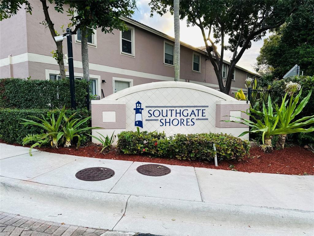 Photo of 8537 W SOUTHGATE SHORES Circle E, Tamarac, FL 33321 (MLS # B26082108)