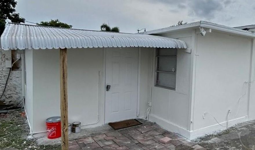 Adorable 1BR/1BA apartment tucked behind a home in Pompano Beach! This cozy space features a charming bedroom with sliding wood closet doors, a small living or office area, and a functional kitchen with full-size appliances, including a stove, oven, microwave, and refrigerator. The bathroom has a cute pedestal sink and walk-in shower. Enjoy cool comfort with a mini split system in the main area and a window A/C in the bedroom (to be replaced soon). Electricity and water are included, plus there’s a shared washer and dryer on site. A quiet, convenient spot at a great price!