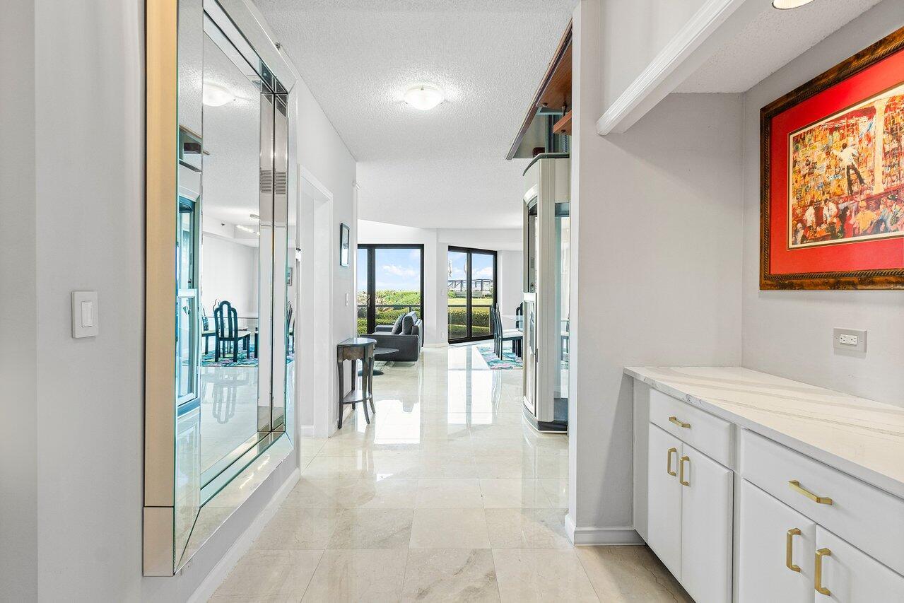 Magnificent oceanfront 3 bedroom - 3 bath townhome in this luxury boutique building. Inside this stunning 2 story home you'll find a curved stair case & elevator, 18' ceilings and 2 story glass overlooking the 3120's grounds, pool area & ocean. A brand new kitchen with stainless steel appliances was just installed. The first floor offer a spacious living room, dining room, kitchen with breakfast room, guest bedroom suite & bathroom and laundry. The 2nd floor host the owners suite with glass privacy walls and a beautiful guest bedroom suite & bath. The 3120 is a gated community with excellent services. Amenities include 24/7 Central Doorman & Security, 1 Car Garage Parking, a beautiful pool & beach area, tennis/pickle-ball, fitness & card rooms.