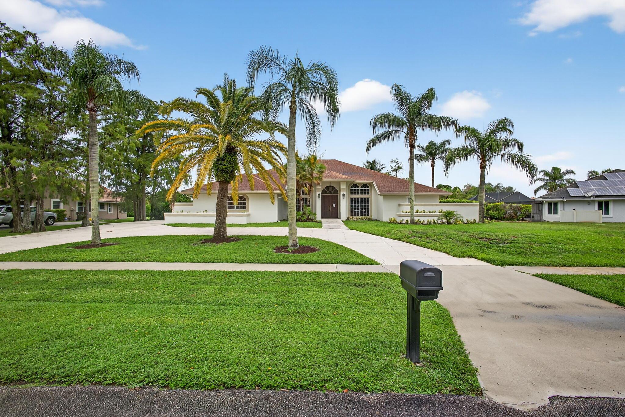 Welcome to your dream home in the heart of beautiful Wellington--home to A-rated schools and an incredible lifestyle! This spacious residence offers 4 bedrooms plus a versatile den that can easily serve as a 5th bedroom or home office. Perfect for multigenerational living, it features a separate in-law suite for added privacy and convenience. Enjoy the Florida sunshine year-round in your private, heated saltwater pool, ideal for relaxing or entertaining. Nestled in a highly sought-after neighborhood known for its safety, charm, and strong sense of community, this home checks all the boxes for comfort, style, and location. Don't miss this rare opportunity!