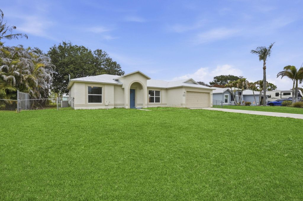 Photo of 2574 SE Richmond Street, Port Saint Lucie, FL 34952 (MLS # B26023400)