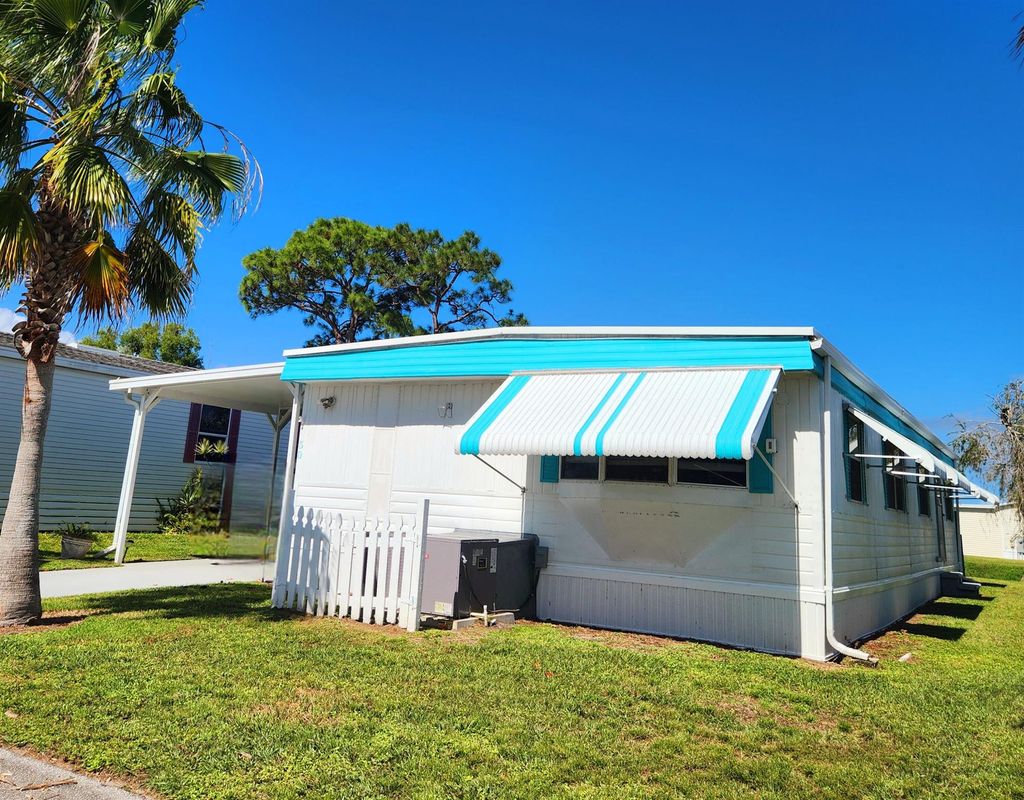 Photo of 30 SE Spanish Way, Port Saint Lucie, FL 34952 (MLS # R11030454)