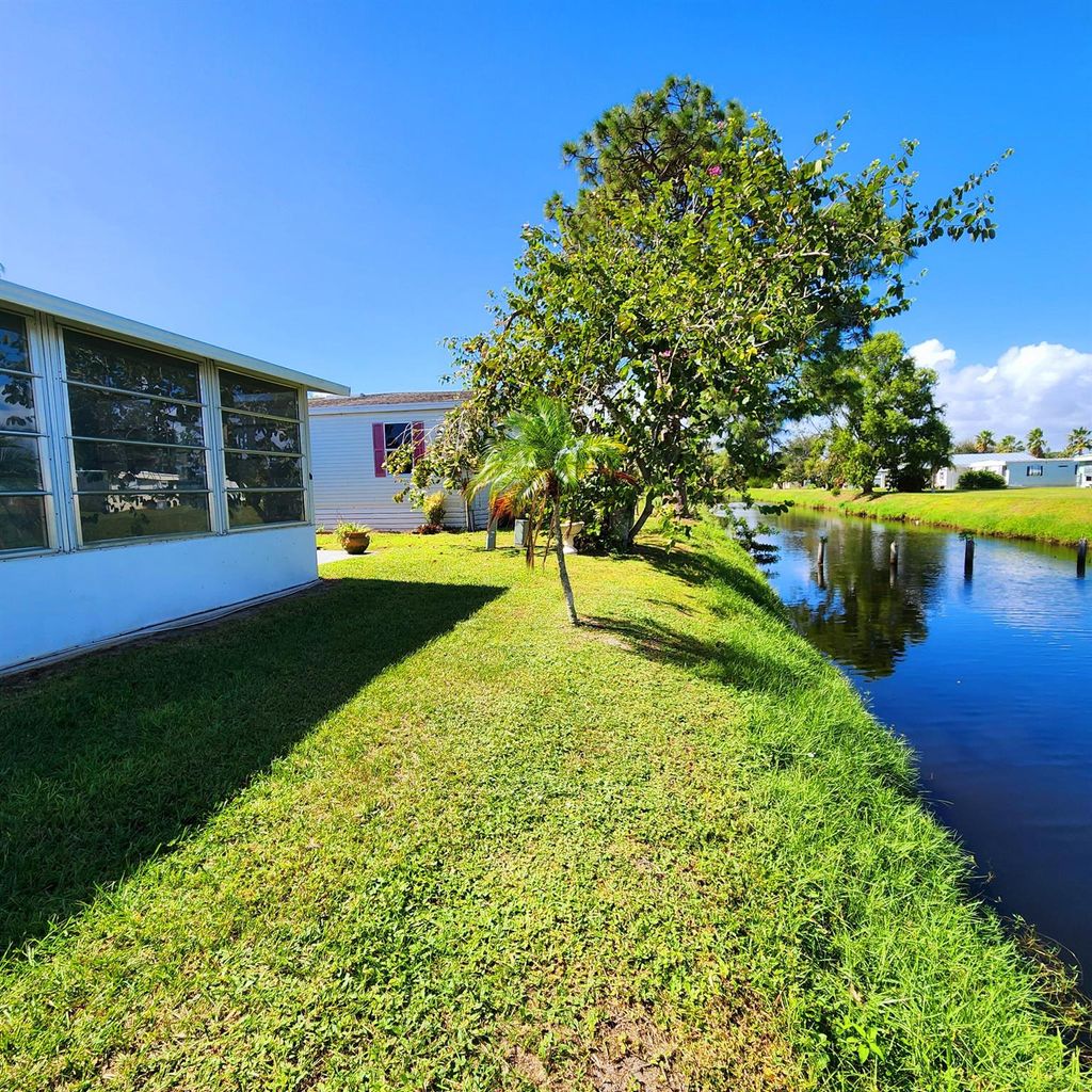 Photo of 30 SE Spanish Way, Port Saint Lucie, FL 34952 (MLS # R11030454)