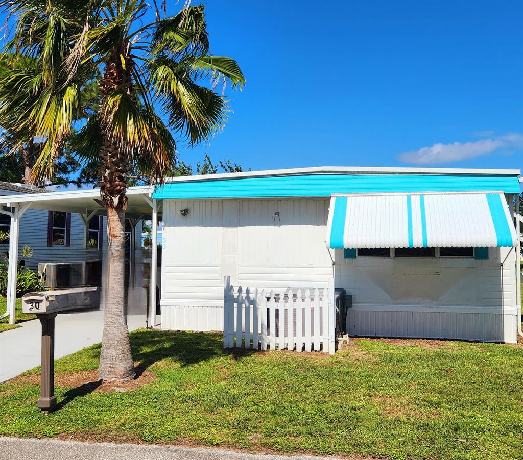 Photo of 30 SE Spanish Way, Port Saint Lucie, FL 34952 (MLS # R11030454)