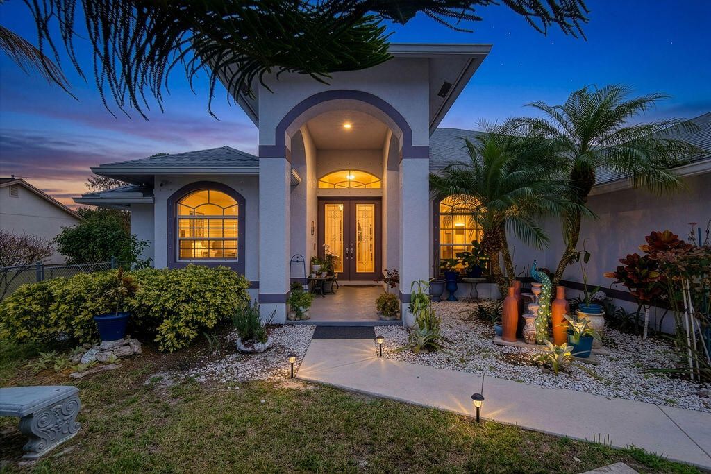 Photo of 662 SW Dwight Avenue, Port Saint Lucie, FL 34983 (MLS # R11168828)