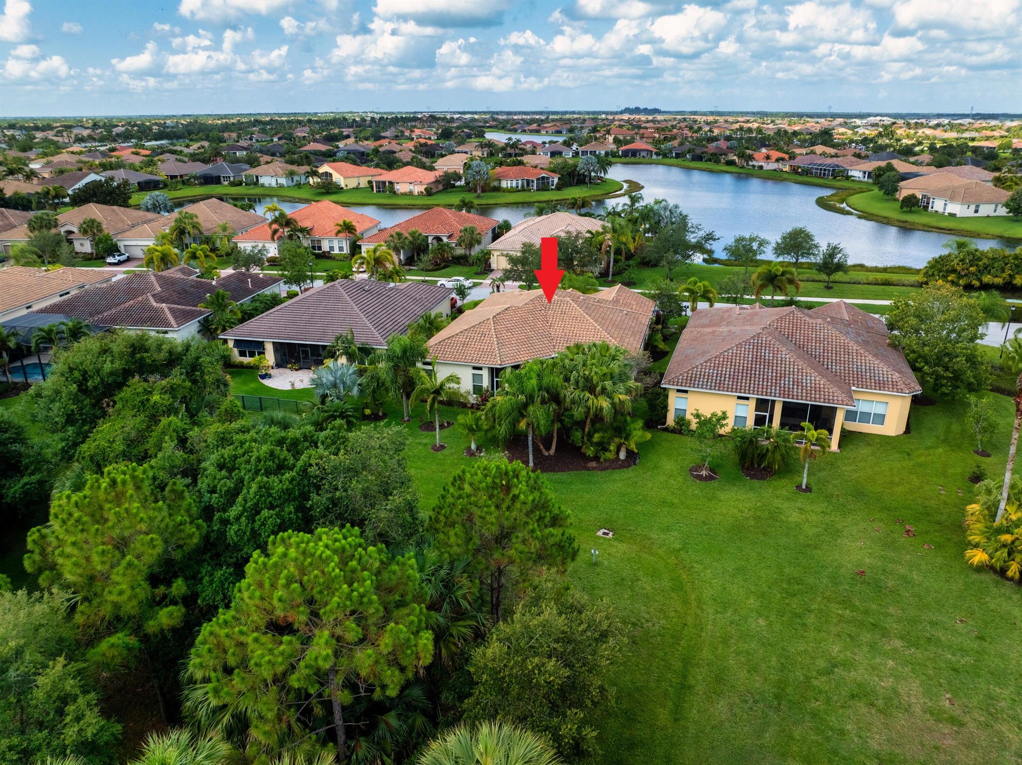 This beautifully designed 3-bedroom, 3.5-bath home with a versatile den offers exceptional living space, thoughtful layout, high-end features throughout, and BRAND NEW APPLIANCES. Built with quality and durability in mind, the home features a classic barrel tile roof and impact-resistant windows for enhanced safety and energy efficiency. Inside, you'll find a large open floor plan that seamlessly connects the oversized family room and spacious living room, creating an ideal setting for entertaining or relaxing. The upgraded kitchen is a standout, boasting 42-inch cabinetry, and rich granite countertops ---perfect for the home chef. The expansive master suite is a private retreat, complete with dual walk-in closets and luxurious his-and-her bathrooms.