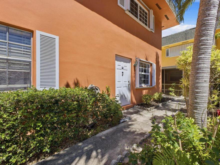 Spacious corner unit featuring 2 primary suites, each with private bathrooms, updated showers & walk in closets. Wood staircase and the first floor is tiled throughout with living room filled with natural light, enhanced by plantation shutters and tropical courtyard & pool views. Major updates include a new roof (2021), impact windows & storm doors [2024], A/C (2019), water heater (2018), and in-unit washer/dryer. The kitchen offers wood cabinetry with plenty of counter space, stainless steel appliances & rear door leading to a shaded BBQ area. Ideally located in the heart of Hollywood, just a short walk to downtown restaurants, shopping, playgrounds & parks and only minutes from Hollywood Beach and the Pier. VA approved community with potential zero down financing. Easy to show anytime!