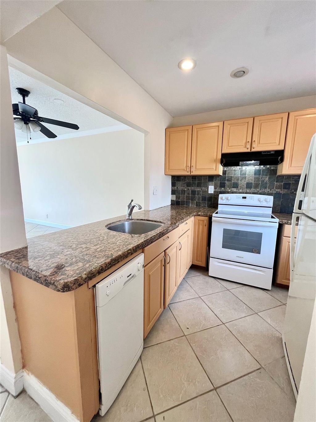 Photo of 5011 W Oakland Park Boulevard #304, Lauderdale Lakes, FL 33313 (MLS # F10477779)