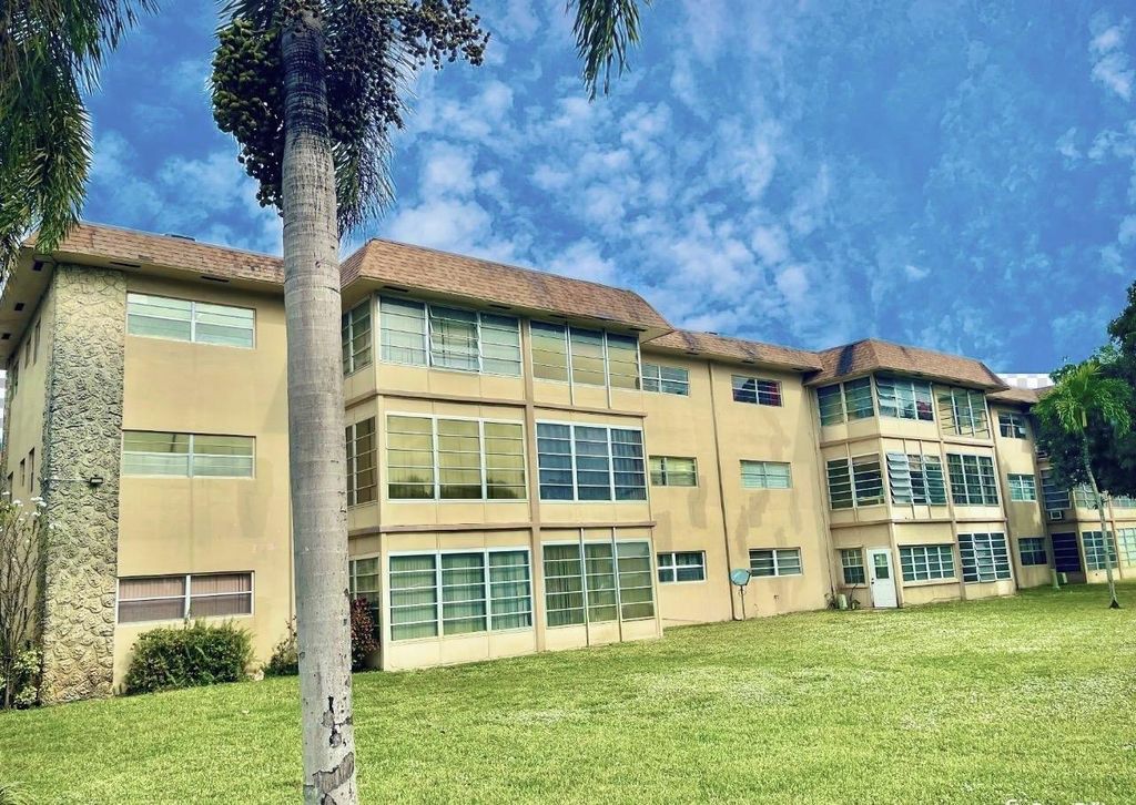 Photo of 5011 W Oakland Park Boulevard #304, Lauderdale Lakes, FL 33313 (MLS # F10477779)