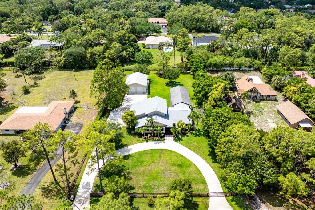 Photo of 6019 NW 69th Way, Parkland, FL 33067 (MLS # F10495924)