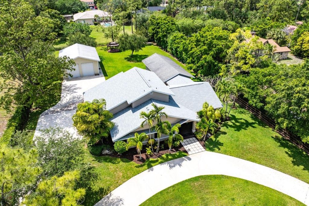 Photo of 6019 NW 69th Way, Parkland, FL 33067 (MLS # F10495924)