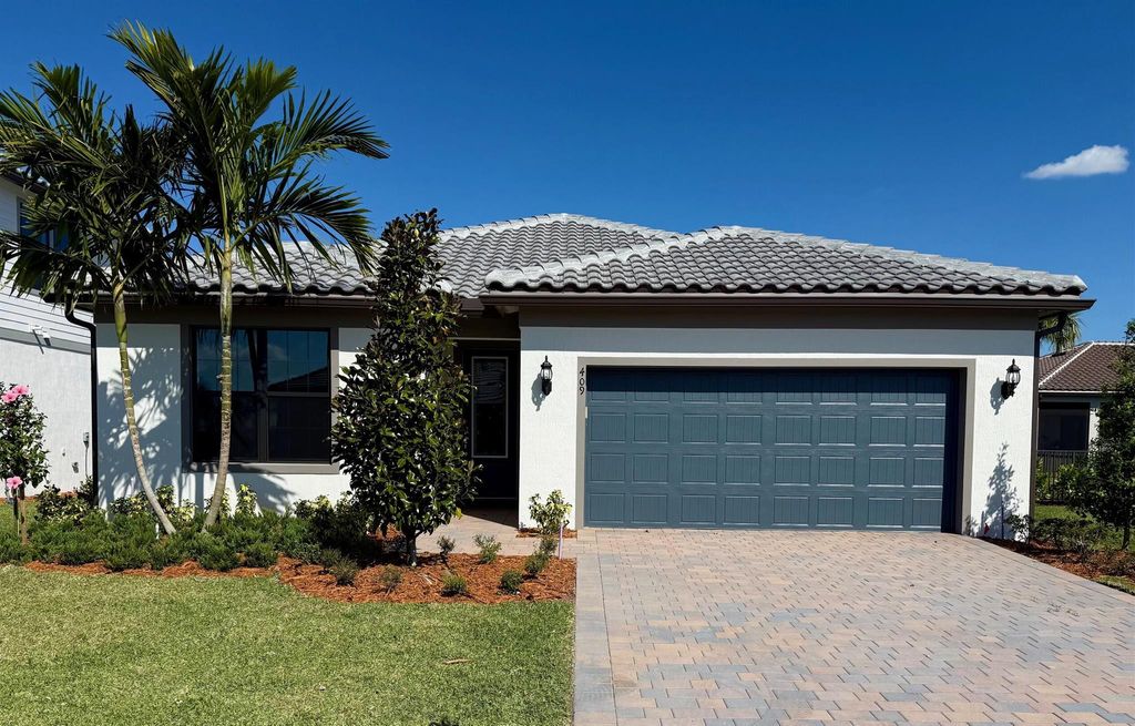 Photo of 409 SE Filoli Drive #Cedar 124, Port Saint Lucie, FL 34984 (MLS # R11075037)