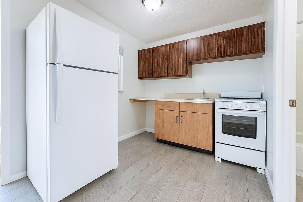 Photo of 3539 Melaleuca Lane, Lake Worth, FL 33461 (MLS # B26078358)