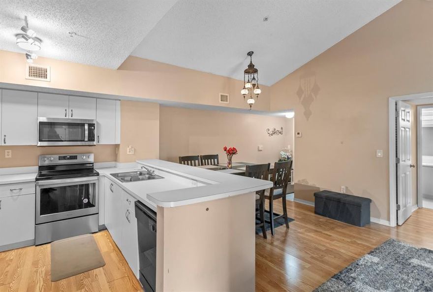 Enjoy comfortable living in this 2-bed, 2-bath condo in Coconut Creek, steps from the Promenade Mall. Features a split floor plan, vaulted ceilings, laminate flooring, and a modern kitchen with stainless steel appliances. Spacious balcony connects the living area and bedrooms.  Located in a gated community with pool, clubhouse, gym, tennis courts, and BBQ area. Close to shopping, dining, casino, top schools, and major highways.