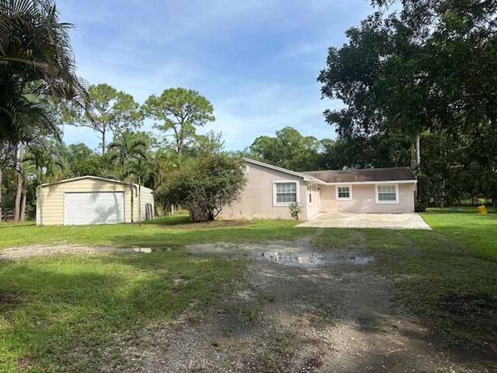 Photo of 15669 97th Road N, The Acreage, FL 33412 (MLS # R11028850)
