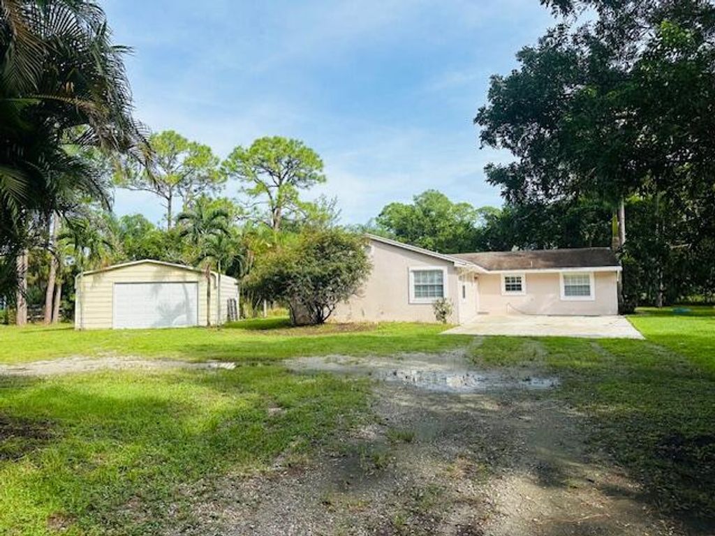 Photo of 15669 97th Road N, The Acreage, FL 33412 (MLS # R11028850)
