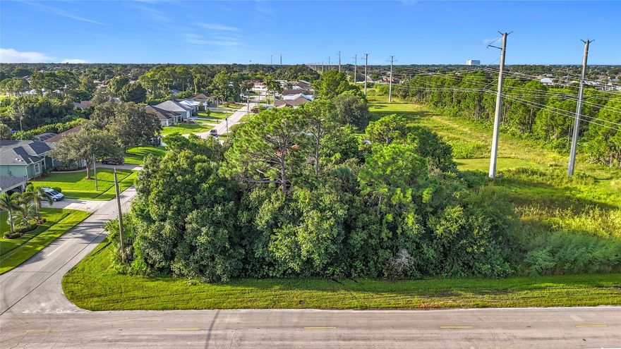 This large (0.27 acre/11,750sq ft) vacant corner lot, located in the sought after community of Oak Hammock, with no HOA, is the perfect location to build your forever home.  The property is within 12 to 15 minutes are essential services such as pharmacies, grocers, Walmart, Home Depot, Hotels, Medical, and Educational Facilities. As well as shopping, entertainment and dining, in the plan community of Tradition. The property is close in proximity to major Florida interstates, such as I-95 and the turnpike. The community also houses the beautiful Oak Hammock Park that includes boat ramp, floating dock, grilling station picnic tables, 2 fishing piers and fish cleaning station, playground, walking, biking and dog walking etc. Also within walking distance is the invincible Paint Ball Park.