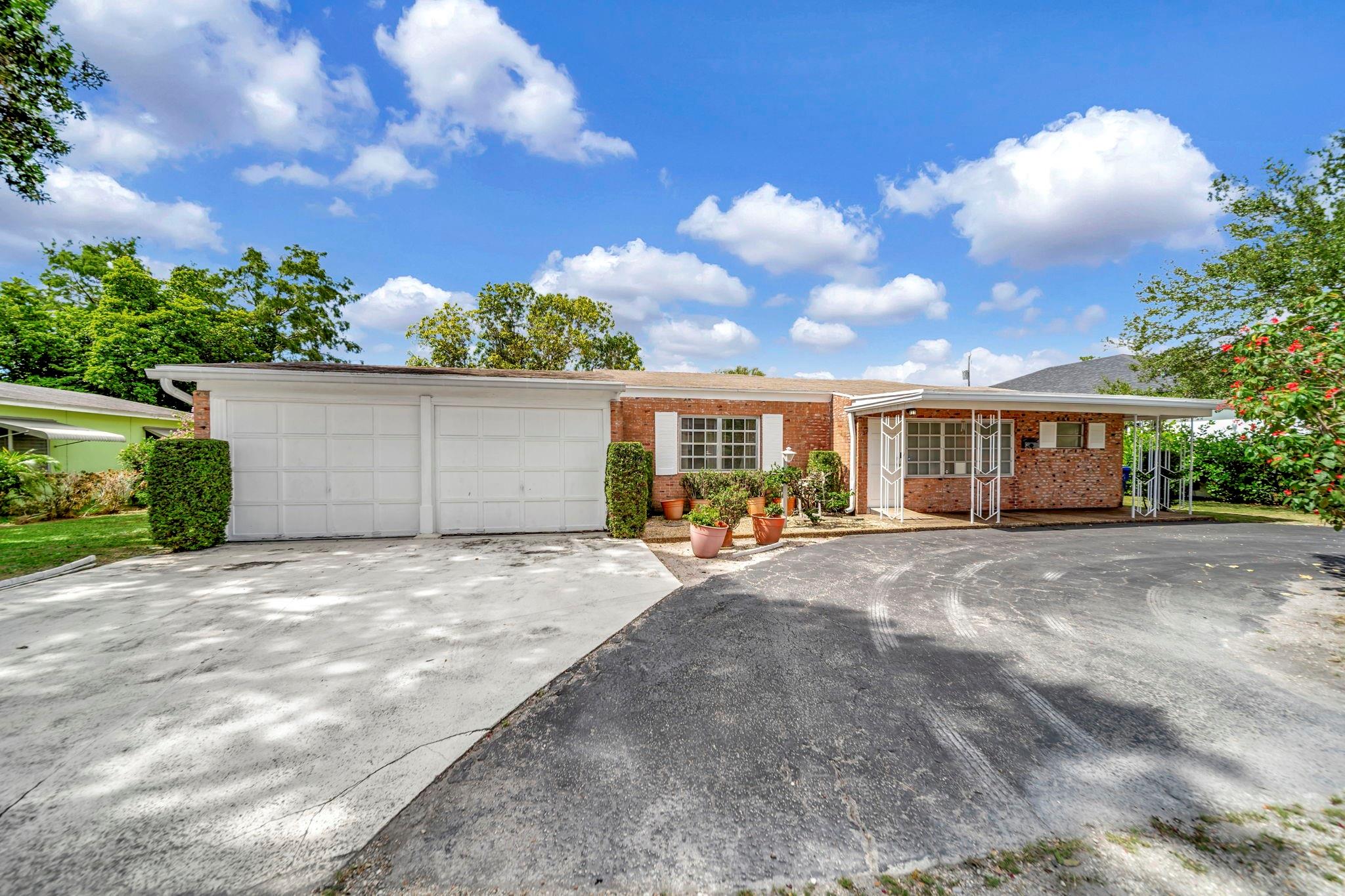An opportunity to put your touches on this wonderfully located double lot home, situated close to Wilton Manors, downtown Ft. Lauderdale and less than 2 miles to the beach. This classic and structurally sound Florida home resides on a spacious 11,007 SF lot. possessing a vintage look with terrazzo flooring, brick walls and wood paneling offering the opportunity to blend modern with nostalgia. Closely located to shopping, restaurants, gyms, parks and the Middle River providing access for paddle boarding and kayaking.