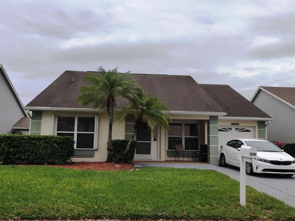 Photo of 1060 NW Tuscany Drive, Port Saint Lucie, FL 34986 (MLS # R10676515)
