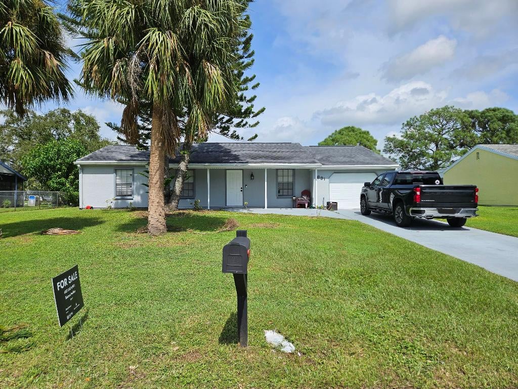 Photo of 691 SW Belmont Circle, Port Saint Lucie, FL 34953 (MLS # R10927272)