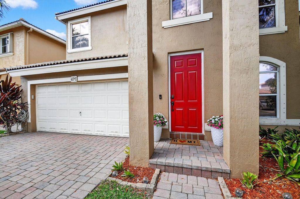 Photo of 6941 Bruce Court, Lake Worth, FL 33463 (MLS # B26005628)