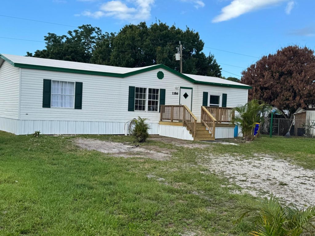 Photo of 1186 SW Tropical Terrace, Stuart, FL 34997 (MLS # B26025998)