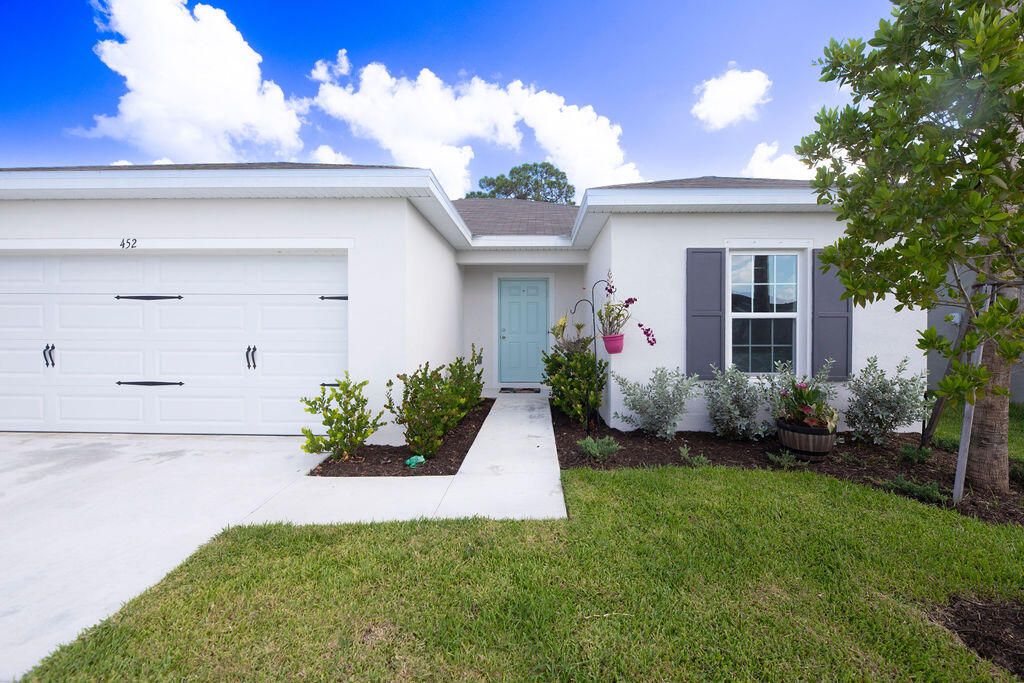 Photo of 452 Cherimoya Street, Fort Pierce, FL 34981 (MLS # R11112013)