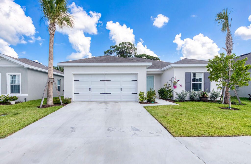Photo of 452 Cherimoya Street, Fort Pierce, FL 34981 (MLS # R11112013)