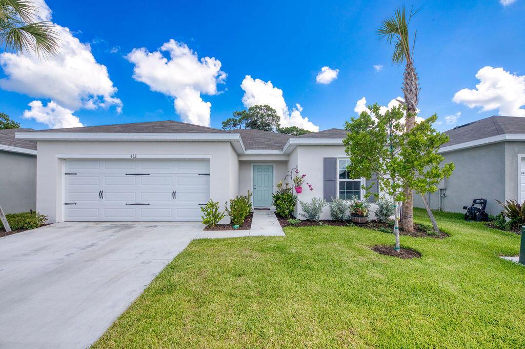 Welcome to this beautifully maintained New Construction Ryan Homes Canary model in the desirable Avalon Crossing community of Fort Pierce. This single-story home offers 3 bedrooms, 2 bathrooms, and 1,302 sq. ft. of bright, open living space. The heart of the home is the modern kitchen, complete with a center island perfect for casual meals or entertaining. The owner's suite features a private bath and a generous walk-in closet, providing a quiet retreat. Enjoy added flexibility with a 2-car garage and an optional lanai space wi ready for your personal touch. Conveniently located near I-95, the Turnpike, and just minutes from beautiful beaches, shopping, dining, and more. Avalon Crossing also offers resort-style amenities and low-maintenance living--perfect for enjoying the Florida lifestyl