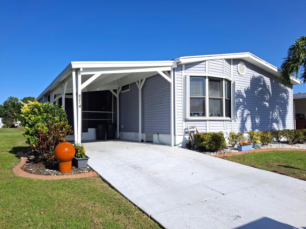Photo of 8214 E Bitterbush Lane, Port Saint Lucie, FL 34952 (MLS # R11081213)