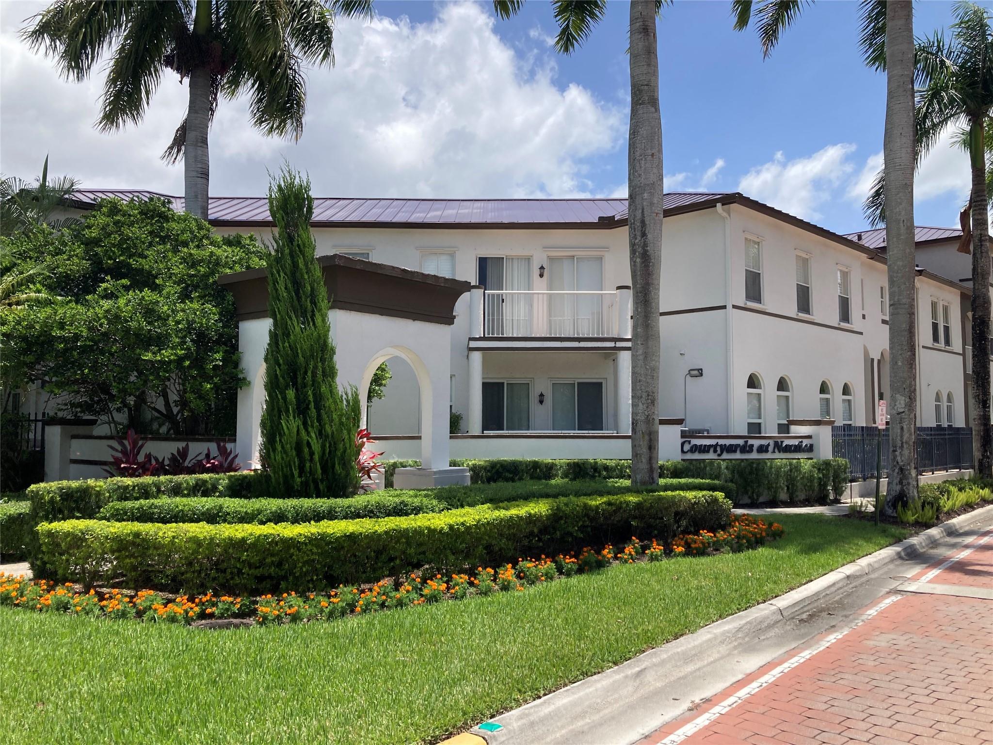 Stylish 2-Story Townhouse in Prime Miramar Location! Don't miss this nice corner-unit townhouse located just minutes from I-75, top-rated schools, shopping, dining, and entertainment! This gated community home features laminate flooring throughout the first floor, an updated kitchen, and bathrooms. Enjoy the privacy and natural light of a corner unit with two assigned parking spaces. Perfect for commuters and families alike—move-in ready and close to everything Miramar has to offer!