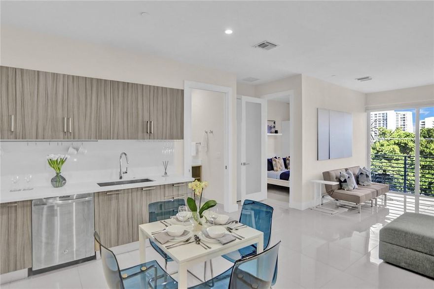 GORGEOUS TOP FLOOR furnished 1 BED/ 1 Bath Condo.  GATED COMPLEX, CONVENIENTLY LOCATED ABOUT 1 MILE TO THE BEACH, PARKS, MALL, RESTAURANTS & LAS OLAS BLVD! ENJOY THE BEAUTY OF FORT LAUDERDALE LIVING. CONDO BUILT IN 2018. VERY PRIVATE.  This is the only Unit located on the 4th Floor of the building.  Beautiful Balconies with City Views.  Large-sized Kitchen and Bathroom with plenty of cabinets. Lots of natural light, sliding glass door, quartz countertops, Impact Window and Door.  Washer/Dryer located inside the Unit.  Water/Sewer and High Speed Internet included.  ASSIGNED PARKING, COMMUNITY POOL, AND DOG PARK. Plenty of Guest Parking