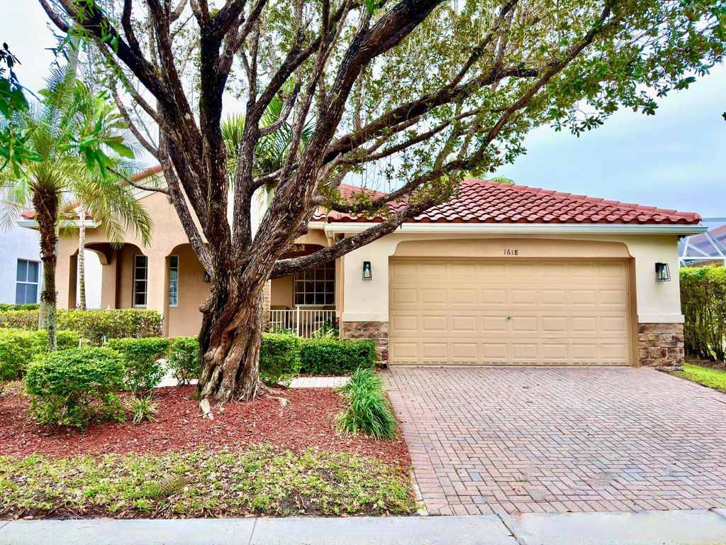 Photo of 1618 Royal Grove Way, Weston, FL 33327 (MLS # B26020583)