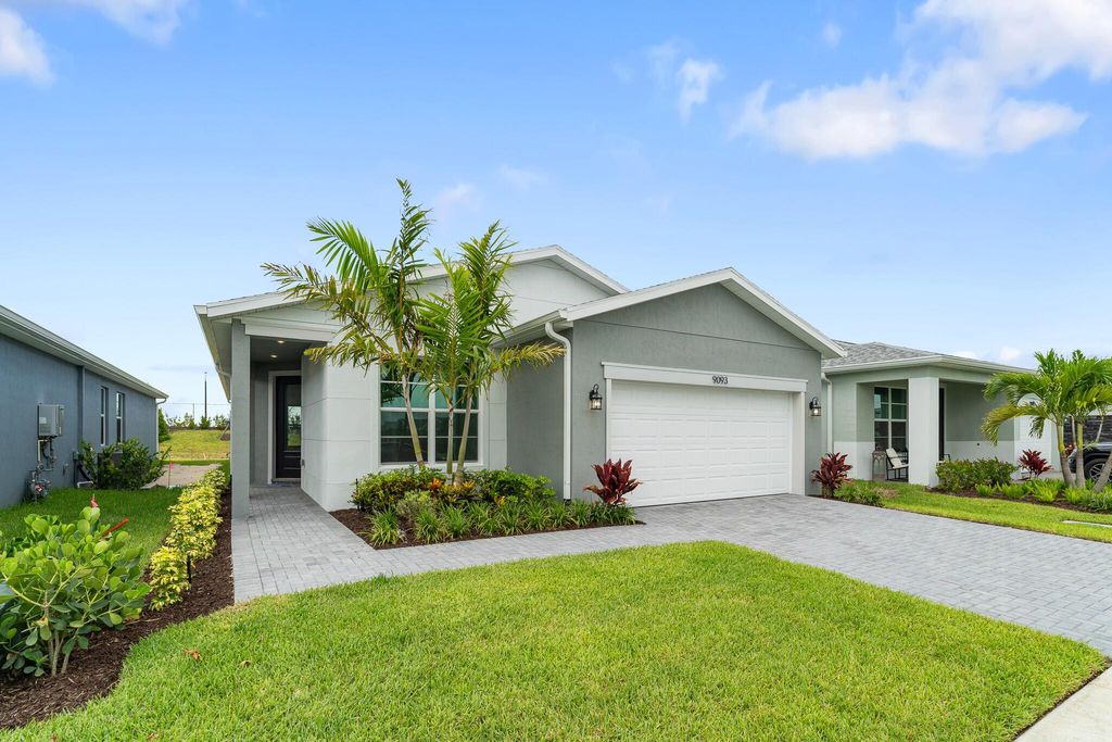 Photo of 9093 SW Remy Lane, Port Saint Lucie, FL 34987 (MLS # R10971851)
