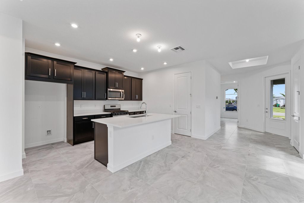 Photo of 9093 SW Remy Lane, Port Saint Lucie, FL 34987 (MLS # R10971851)