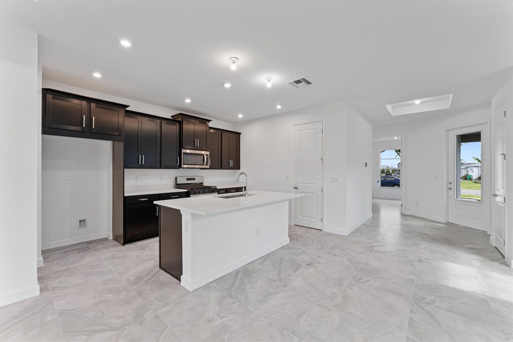 Photo of 9093 SW Remy Lane, Port Saint Lucie, FL 34987 (MLS # R10971851)