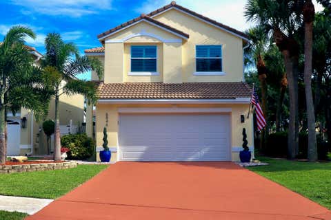 Photo of 6846 Sugarloaf Key Street, Lake Worth, FL 33467 (MLS # B26047291)
