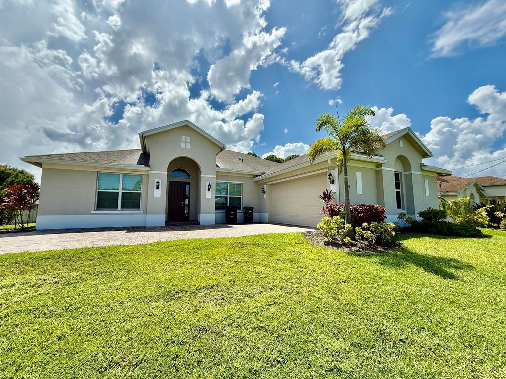 Photo of 293 SW Ridgecrest Drive, Port Saint Lucie, FL 34953 (MLS # R11113636)