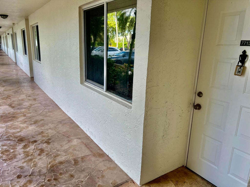 Photo of 7713 TRENT Drive #107, Tamarac, FL 33321 (MLS # B26086734)