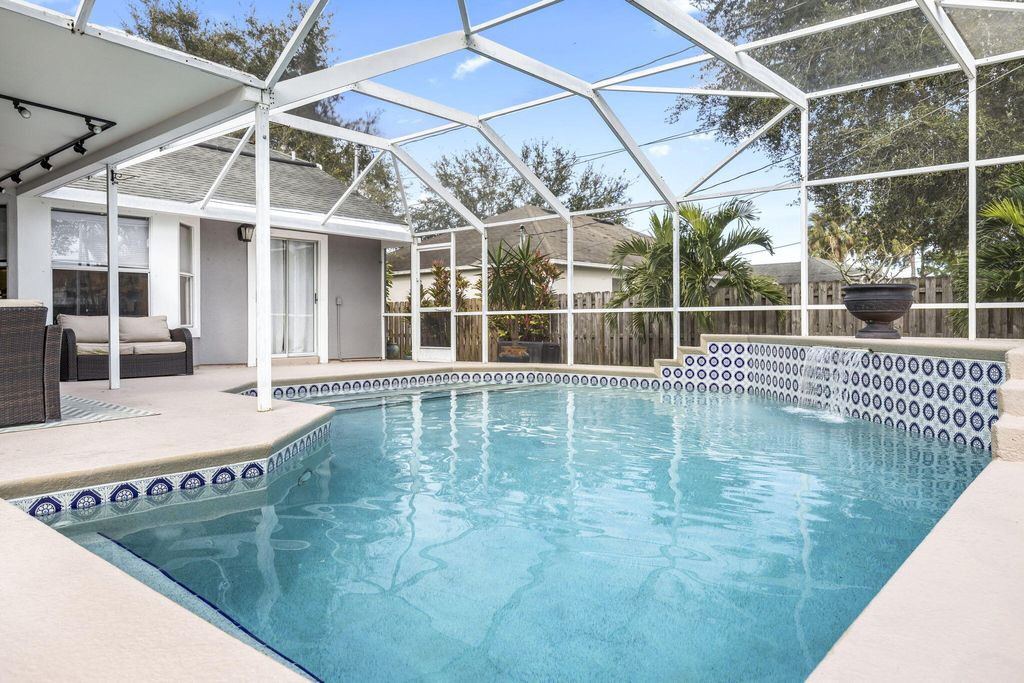 Photo of 1120 SW Abbey Avenue, Port Saint Lucie, FL 34953 (MLS # R10922706)