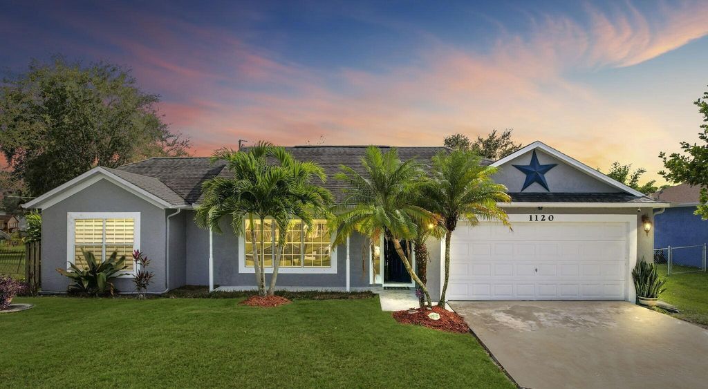 Photo of 1120 SW Abbey Avenue, Port Saint Lucie, FL 34953 (MLS # R10922706)