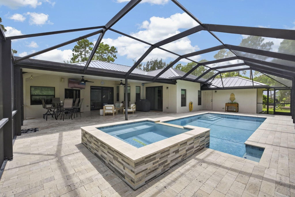 Photo of 17377 W ALAN BLACK Boulevard, The Acreage, FL 33470 (MLS # B26060929)