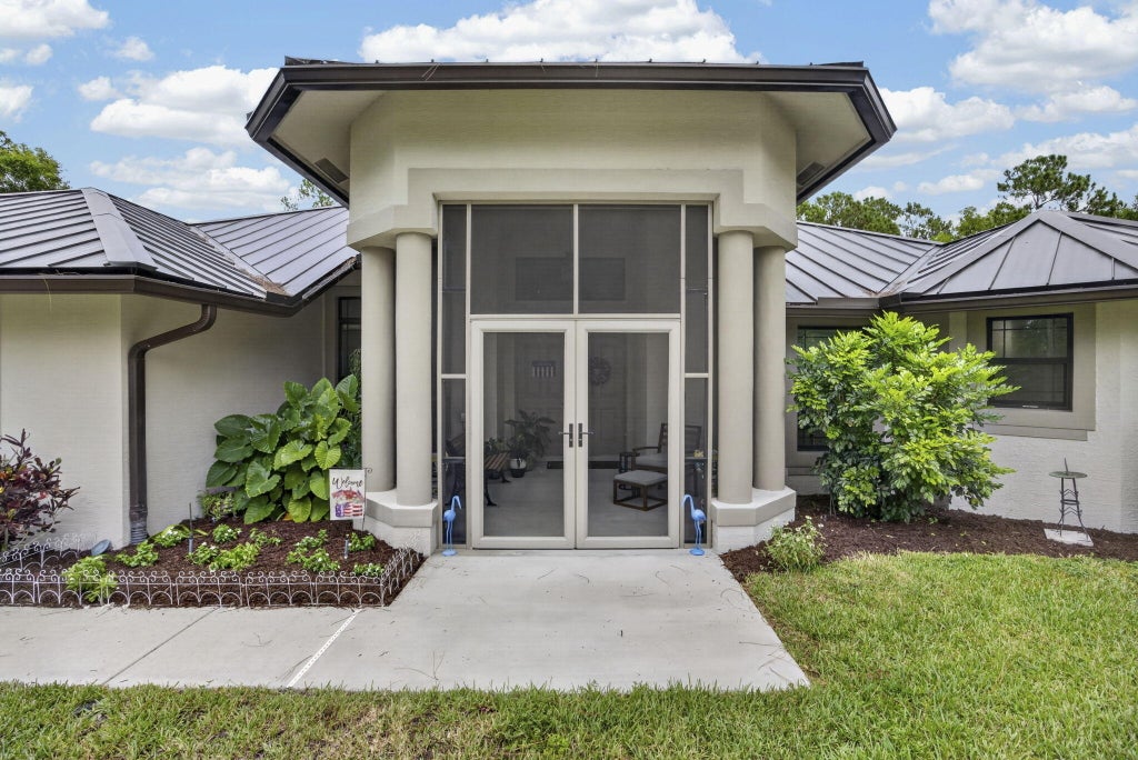 Photo of 17377 W ALAN BLACK Boulevard, The Acreage, FL 33470 (MLS # B26060929)